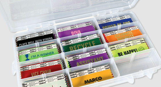 Badge ribbon organizers neatly storing custom and in-stock ribbons for easy access